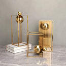 Esculturas Geométricas de Metal Dourado